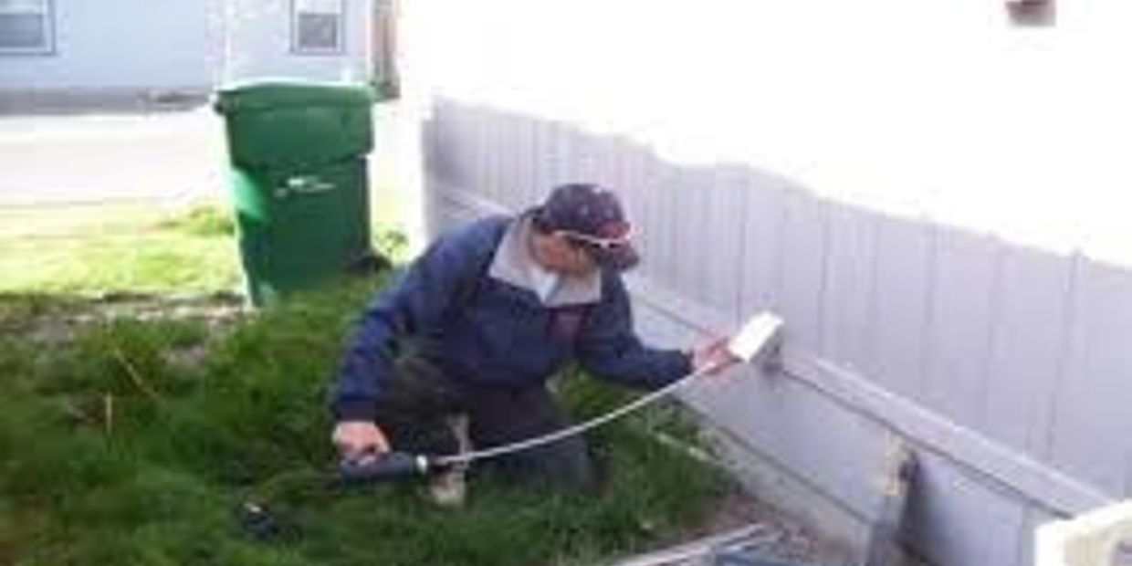 a tech cleaning a dryer vent