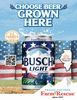 Busch Light beer with fresh hops in a snowy farm scene.