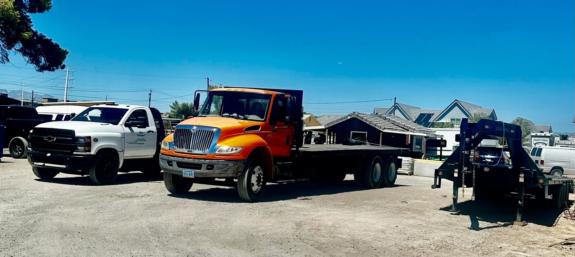 Flatbed trucks available for all your logistics needs. Inside garage drop, Off-road fork lifts B-cat