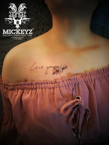 Beautiful script and coloured flowers inked at Mickeyz Tattoo Studio, the best tattoo studio, Mumbai