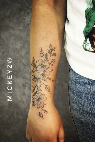 Flower tattoo made with precision at Mickeyz Tattoo Studio, the best tattoo studio, Mumbai
