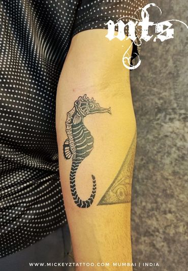 Custom seahorse tattoo at Mickeyz Tattoo Studio, Mumbai, with clean detailing and precision