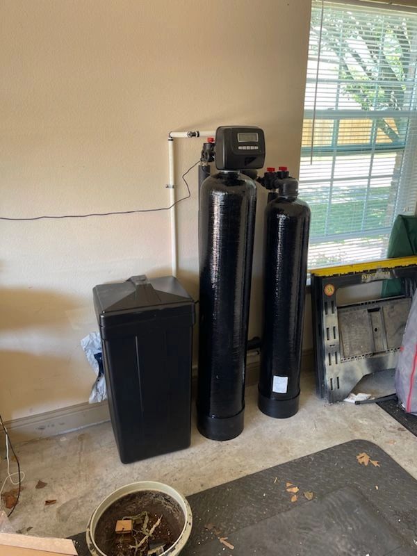 Whole house water softener with separate carbon filtration.