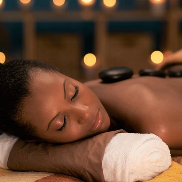 Break the tension with a Hot Stone Massage at Esther's Wellhouse - Esther's  Wellhouse