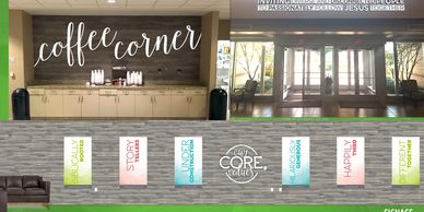 Interior space with a coffee corner, entrance doors, and core values displayed on the wall.