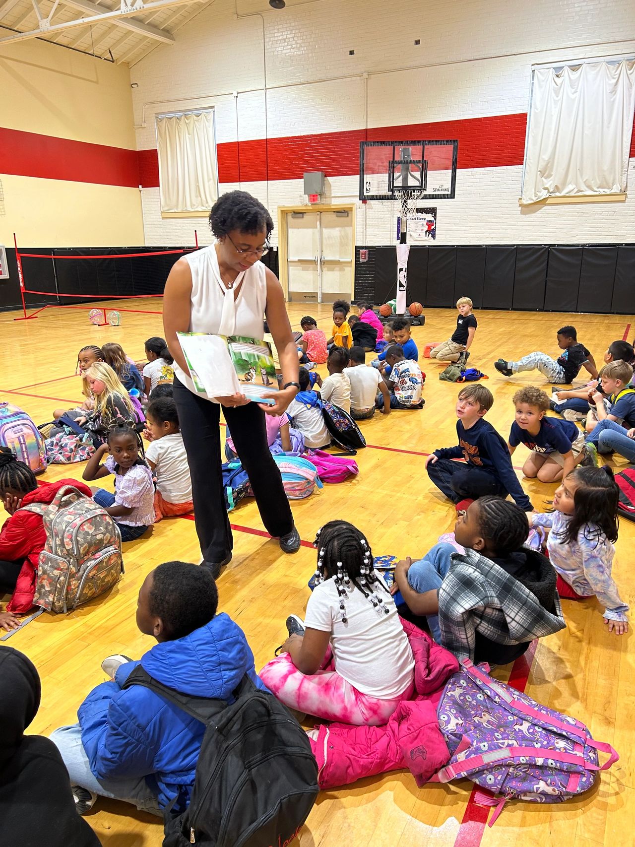 Reading to first grade students at C.G. Credle Elementary School.