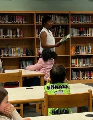 Reading to students at Tar River Elementary School
