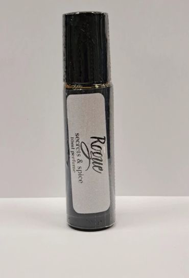 A black bottle labeled 'Rogue' with secrets &amp; spice 10ml perfume.