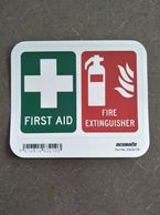 A first aid kit and fire extinguisher sticker.
