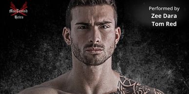 Portrait of a muscular man with a tattooed shoulder against a dark background.