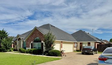 Completed roof replacement on a home in Burleson, Tx by Mason Roofing
