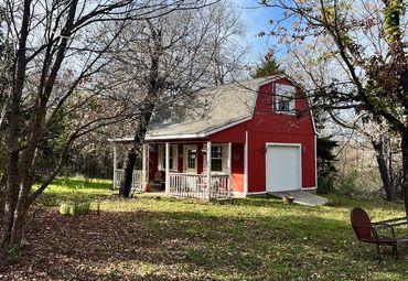 Barn with aging shingles scheduled for replacement in Crowley, tx