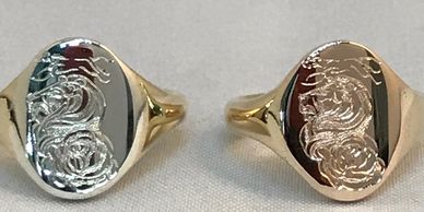Pair of hand engraved  gold rings with family crest