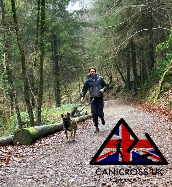 man running with his dog 