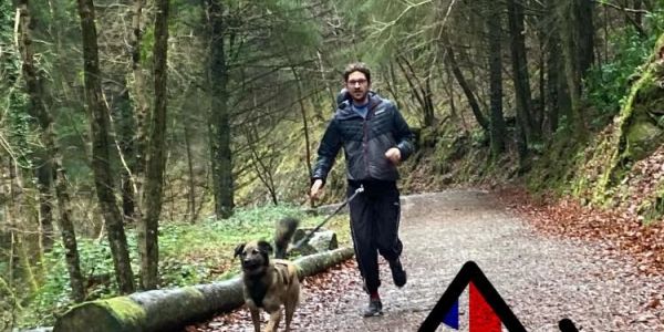 man running with his dog 
