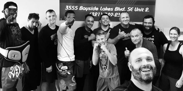 Amazing students men, women & children after a amazing Jiu Jitsu class in Palm Bay Florida.