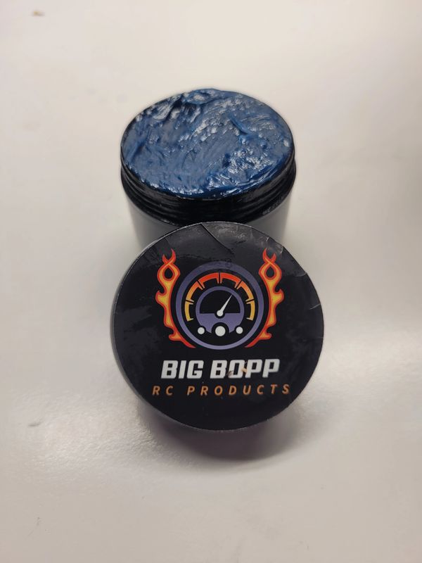 Open container of Big Bopp RC Products wax or grease.