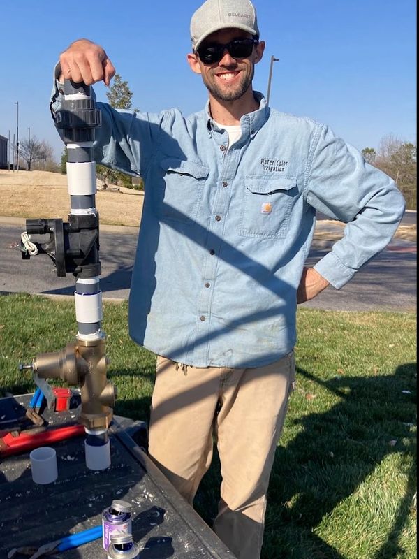 Owner, Scott Brown, pictured with a 2-inch PRV and Master valve installation in Collegedale, TN.