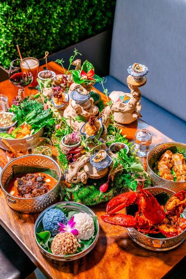 Farmhouse Thai popular dishes spread on wooden table
