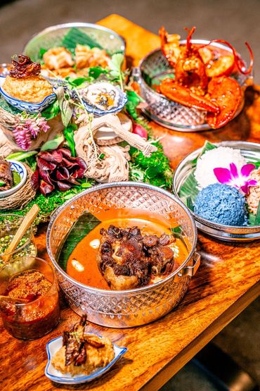 Farmhouse Thai popular dishes spread on wooden table