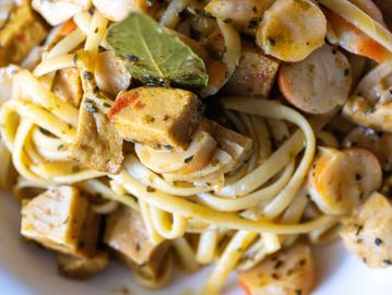 close up of pasta with vegan sea food