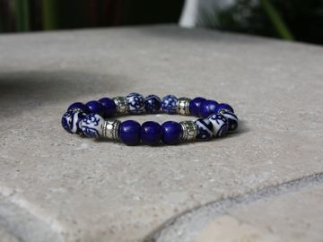 Royal Blue Beaded Bracelet with Silver Accents. Elastic cord.