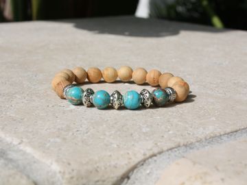 Rosewood Beaded Bracelet with Turquoise and Silver Accents. Elastic cord.