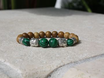 Rosewood Beaded Bracelet with Buddha Charms. Malachite and Silver Accents. Elastic cord.