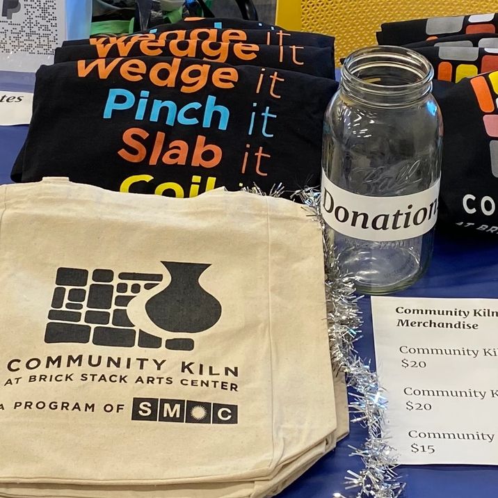 A photo of a bag with Community Kiln's logo