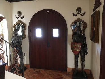 Two Armored Knights standing guard inside the front entrance to Sanibel Manor House.