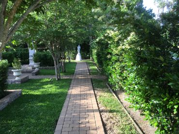 Looking north along the back path in Sanibel Gardens - Oak Grove Island, Georgia. 