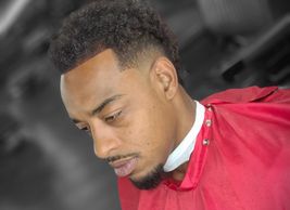 Famous Cutz Barbershop haircut on a man