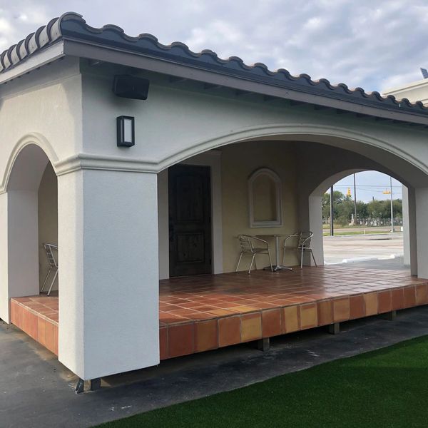 Stage for live music built in the courtyard of London Square Plaza