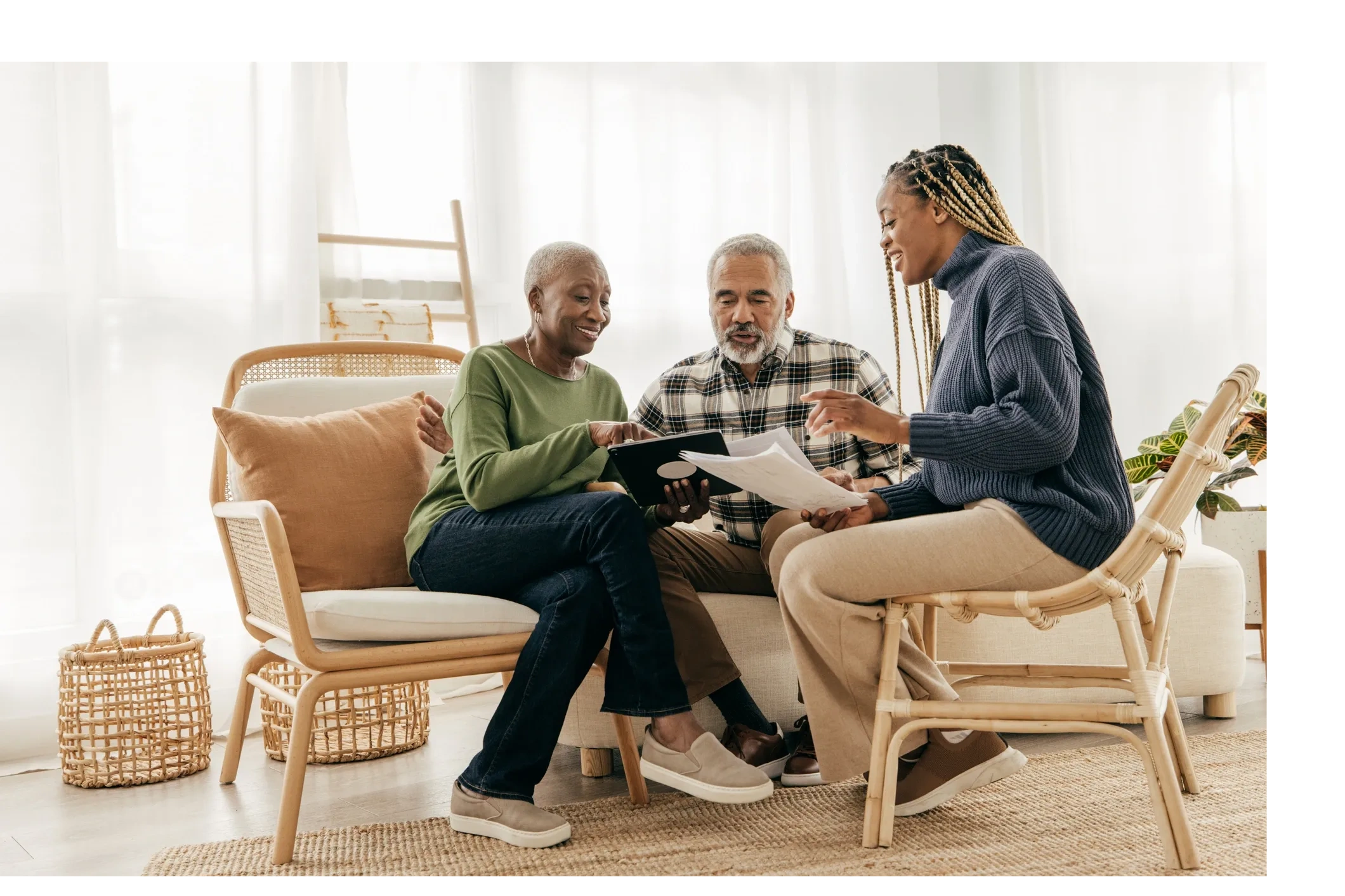 Licensed insurance broker reviewing Medicare and ACA health coverage options with clients.