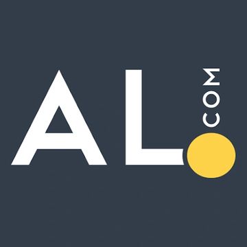 Logo with text 'AL.com' featuring a yellow dot.