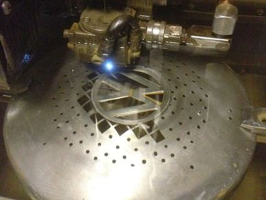 Wire EDM of Volkswagen hub cap.