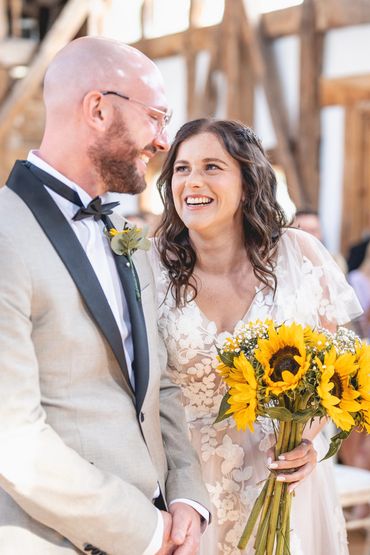 A bride and groom looking at each other