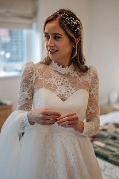 A picture or a bride in her white wedding dress