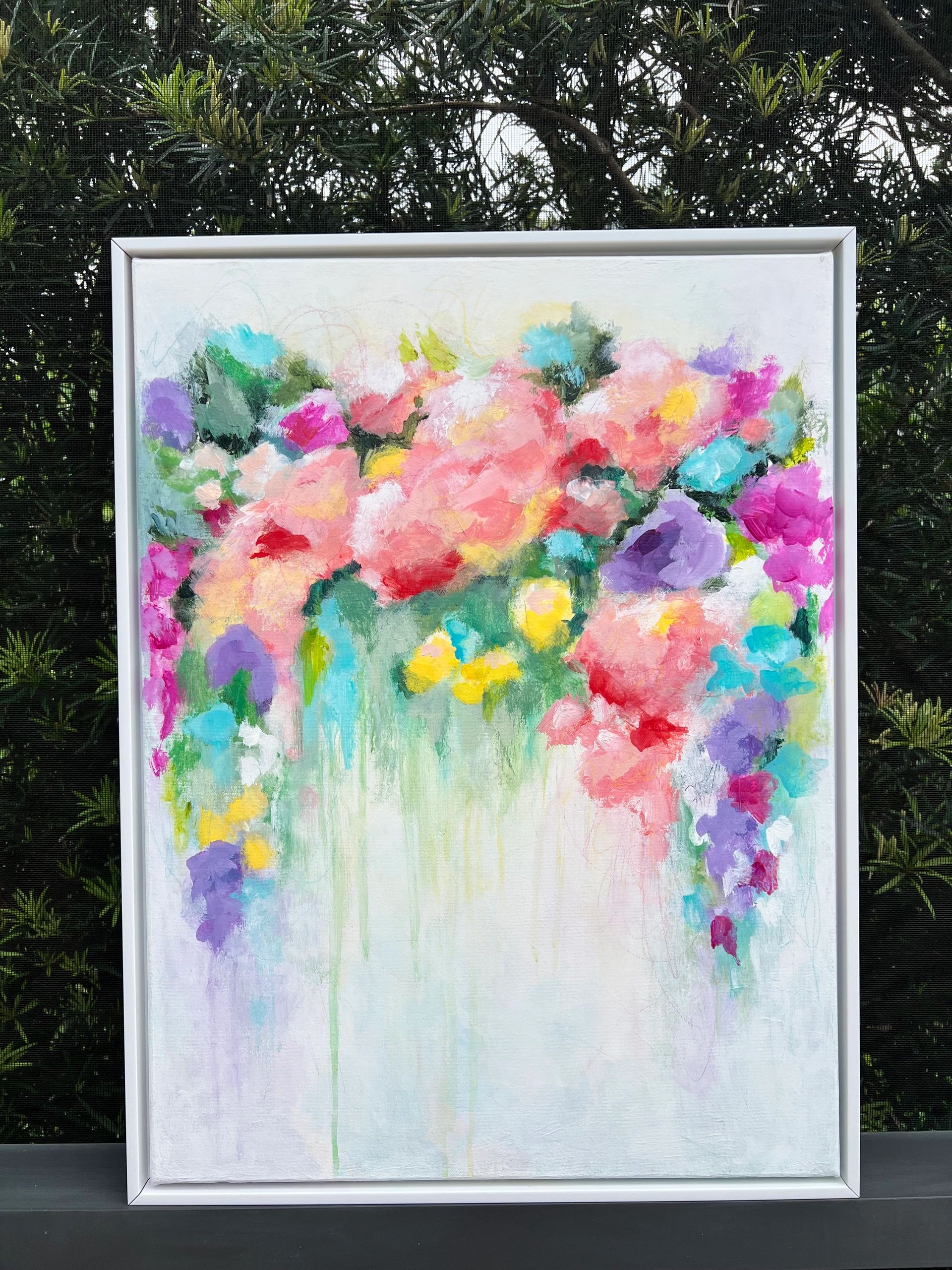 Abstract floral painting with vibrant colors and soft brushstrokes.