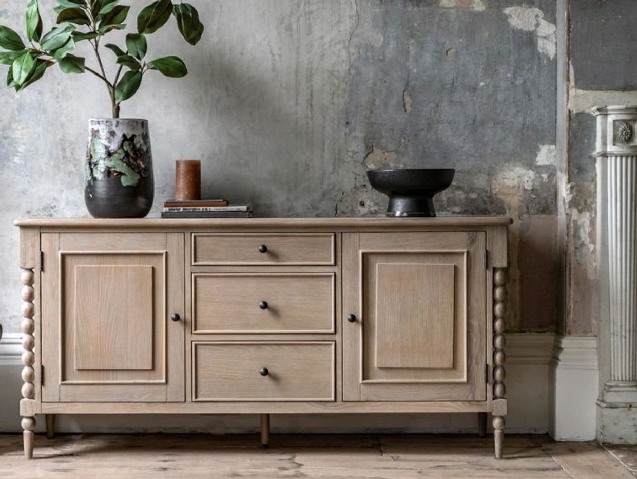 The Spindler Sideboard brings classic craftsmanship into a modern setting. Designed with intricate b