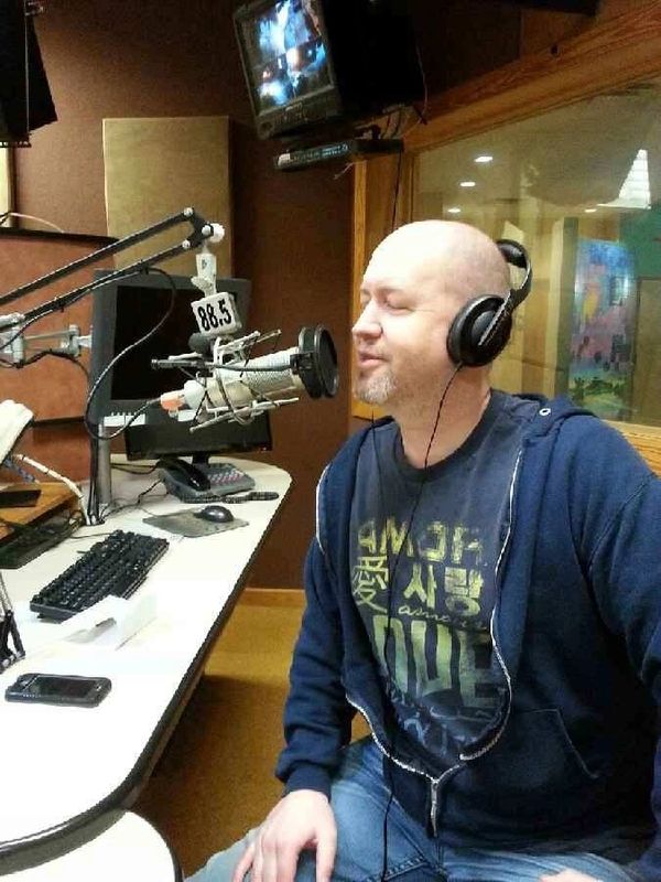 a man speaking into mic