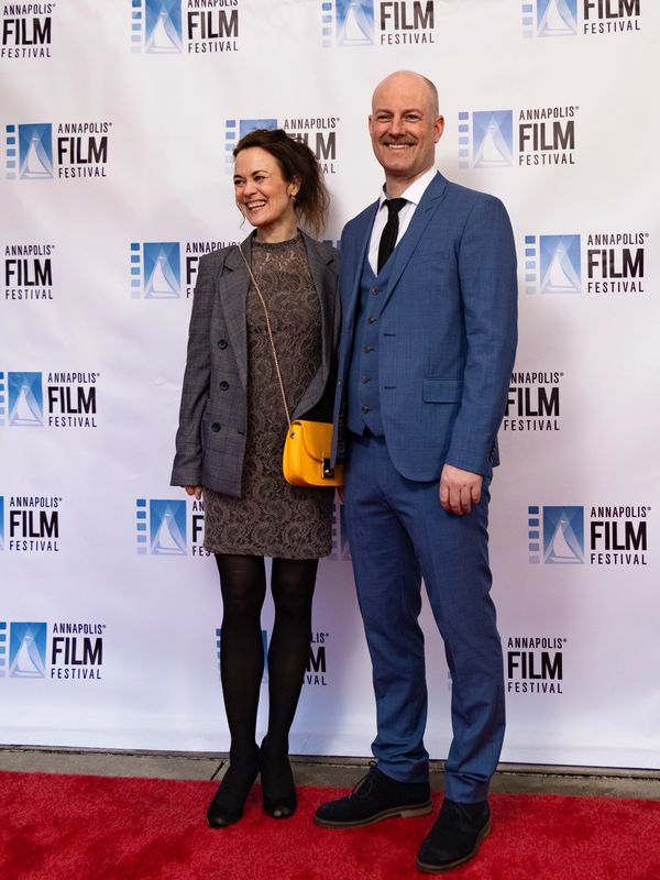 a man and woman at the Film Festival 