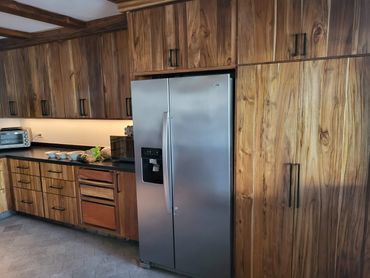 Large ocean view kitchen with solid teak cabinets.