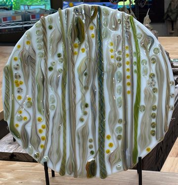 14" White dish laden with Vitrigraph & Murrini. "Twistie" pieces of Vitrigraph are dramatic when the