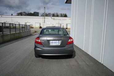 Honda civic EX grey, sold by Parabolica Motors. Available in Richmond, British Columbia. 