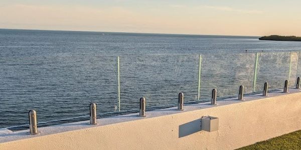 Frameless glass balcony on a roof top
