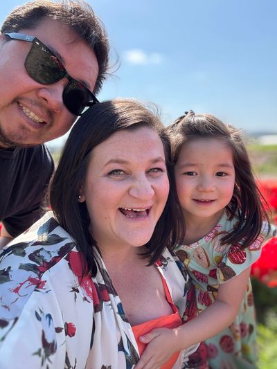 Photograph of candidate Amy Huo and her family. 