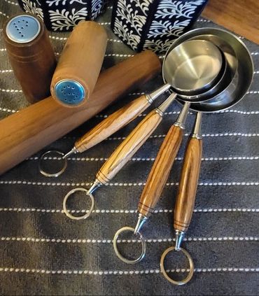 Measuring Cups and Salt and Pepper Shakers