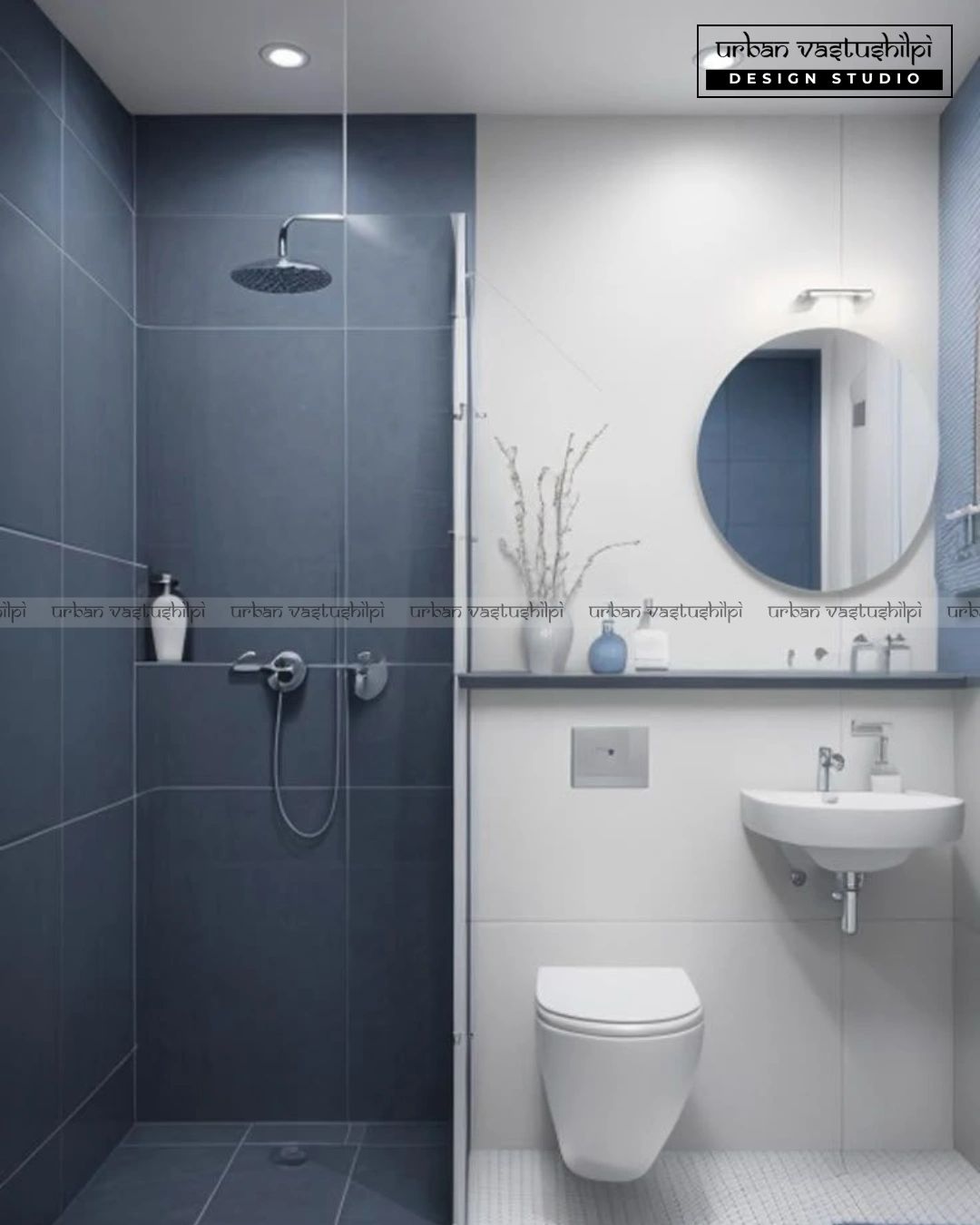 Modern bathroom with dark blue shower tiles and white fixtures.