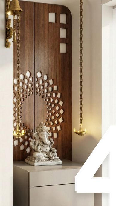 A serene Ganesh statue setup with wooden backdrop and hanging brass lamps.